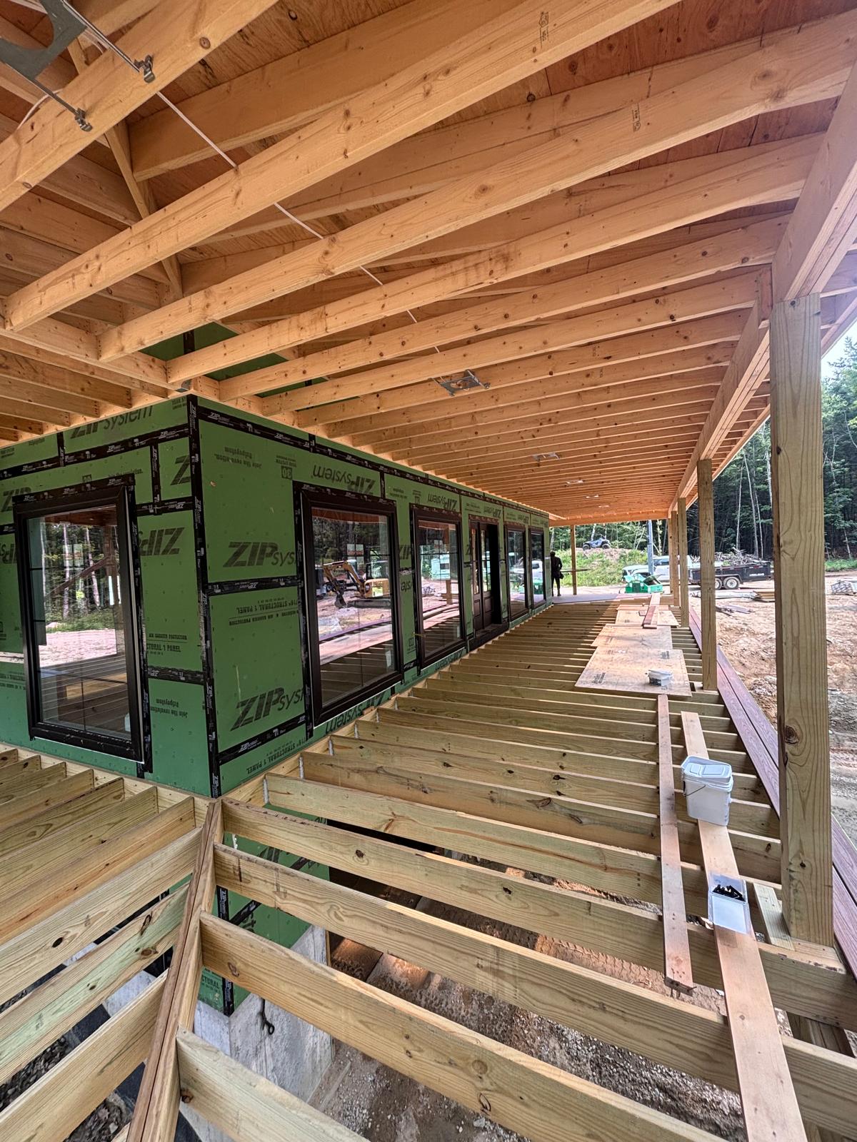 Covered porch framing with exposed rafters
